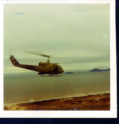 HML167_Huey_Gunship_Over_South_China_Sea.jpg